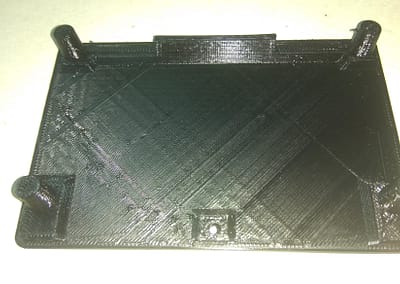 Impresión del nueva tapa en PLA negro.